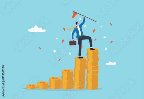 Financial success, reaching financial freedom, money achievement or earning profit or savings or investment goal concept, success businessman holding winning flag on top of money coins stack.