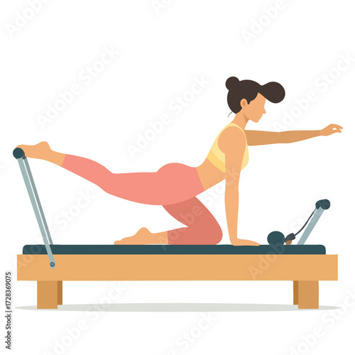 A woman performs a Pilates exercise on a reformer machine, stretching and balancing.