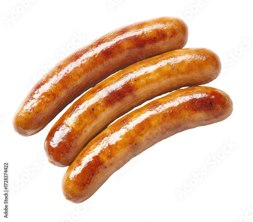 Three cooked sausages, slightly overlapping,  on a black background