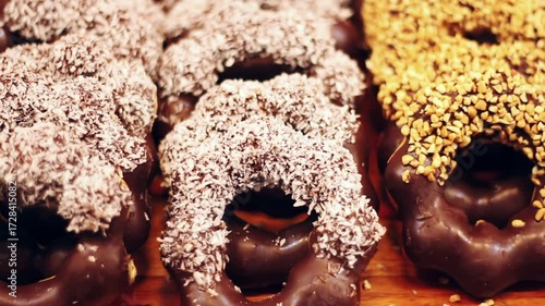Sweet and fluffy donuts, a popular street food treat, perfect for a quick snack or indulgent dessert on the go