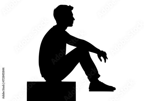 Vector art of silhouette of person sitting on block