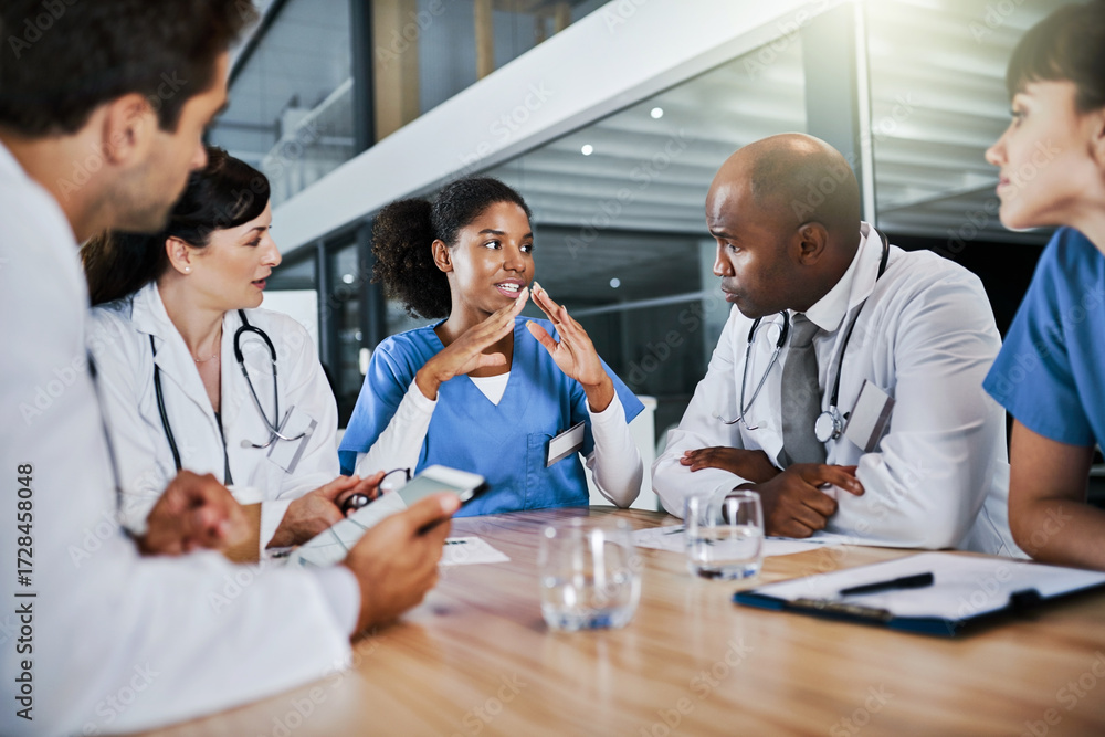Obraz premium Doctors, strategy and ideas in boardroom, meeting and collaboration for treatment plan and hospital. Coworkers, discussion or teamwork for healthcare, talk and people with medical solution in clinic
