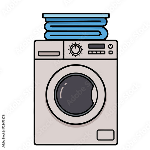 Modern frontloading washing machine with stack folded blue towels on top