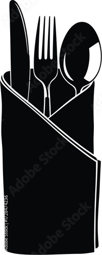 Black cutlery set in a napkin, dining utensils, restaurant service