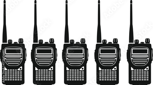 Black walkie-talkie devices, communication equipment, security tools, portable radios, emergency gear, identical models, long antenna, professional use, outdoor coordination, tactical support