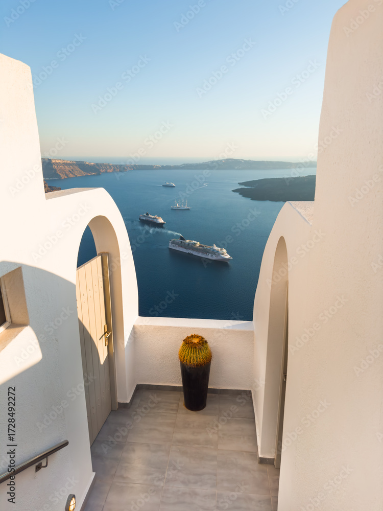 Fototapeta premium White architecture in Santorini island, Greece. Beautiful seascape at sunset.
