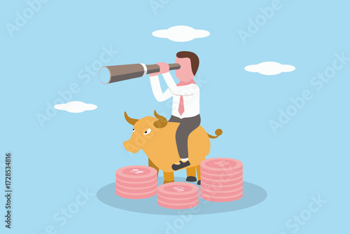 Businessman riding a bull and looking through a telescope with stacks of coins representing financial growth and future investment