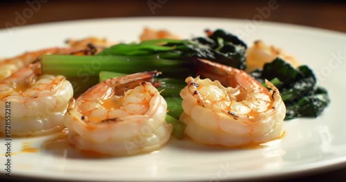 Shrimp and greens beautifully plated for a gourmet meal