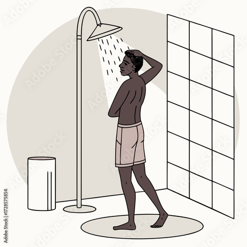 African man taking shower in the bathroom