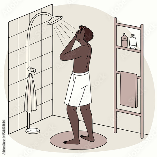 African man taking shower in the bathroom
