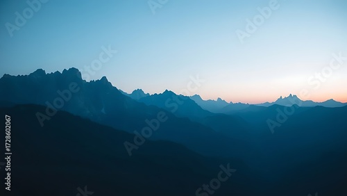 A mountain landscape during blue hour, with a soft twilight glow enhancing the natural scenery.