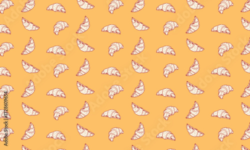 Rustic Hand Drawn Croissant Seamless Pattern on Orange Background