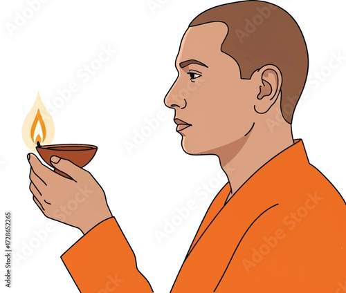 A man in an orange robe holds a small oil lamp with a flame, symbolizing light and spirituality.