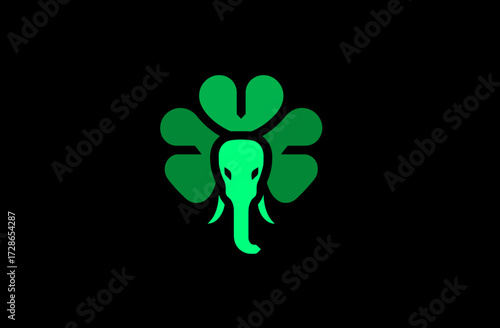 A green elephant head integrated into a four-leaf clover against a black background