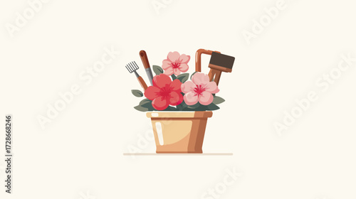 Gardening tools and flowers in pot