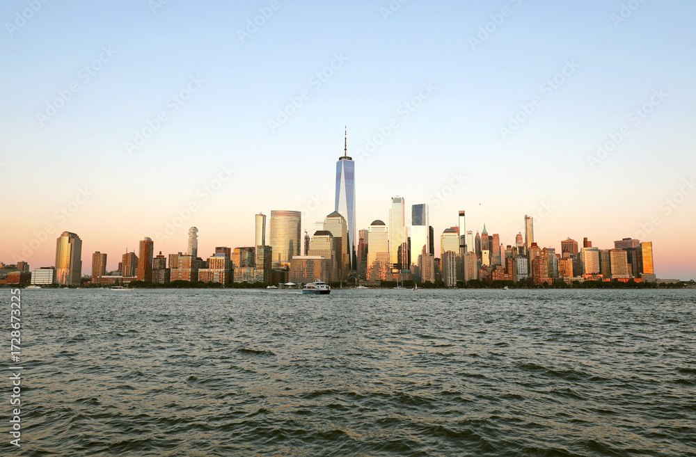 Obraz premium New York USA skyline with urban skyscrapers and One World Trade Center with Freedom Tower