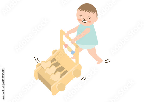 笑顔で手押し車を押して歩く幼い子ども