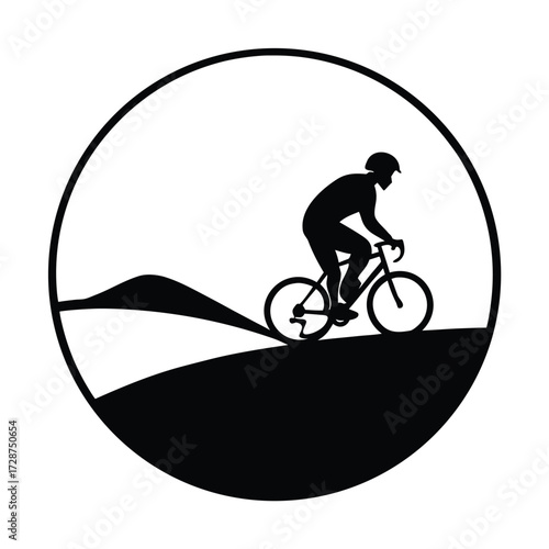 Cyclist silhouette in a circular frame on a hilly landscape bicycle cycling