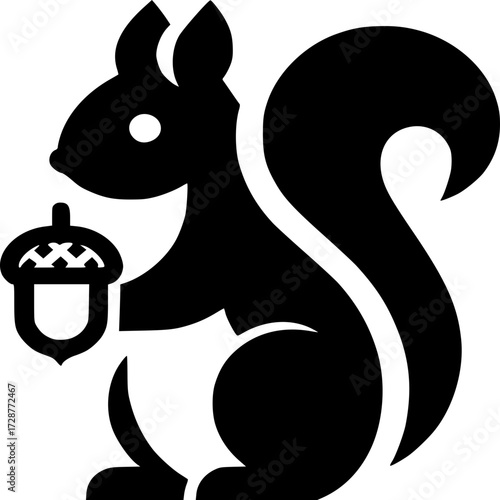 Squirrel with Acorn Silhouette: A sleek silhouette of a squirrel, poised gracefully while clutching a single acorn, symbolizing nature's beauty and the joys of the woodland.