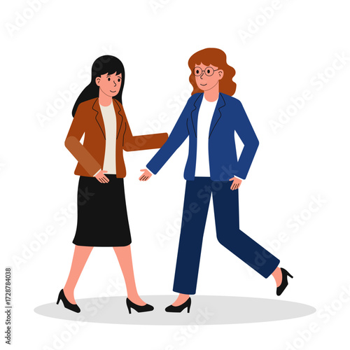Businesswomen greet each other in a friendly meeting setting during a professional networking event