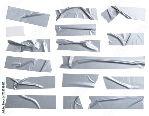Assorted pieces of crumpled silver tape on a white background