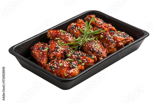 Juicy chicken wings in Korean spicy marinade isolated on transparent background