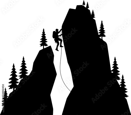 Adventurous climber rappelling down a steep, rugged mountain in a powerful black silhouette