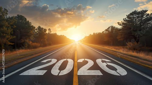 2026 New Year concept with large white numbers on empty asphalt road leading to sunrise horizon, symbolizing journey, hope, new opportunities, and future goals.