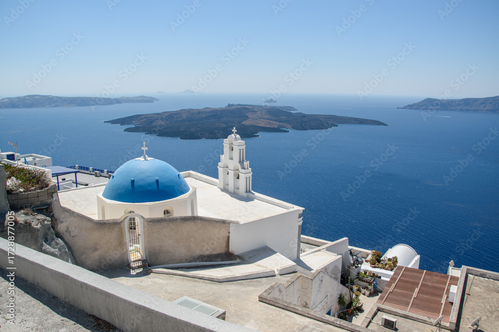Fototapeta premium Blue Dome and Belfry above the Santorini Caldera, Fira, Greece