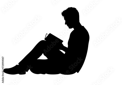 Silhouette of a man engrossed in reading a book, fostering a sense of calm and focus.