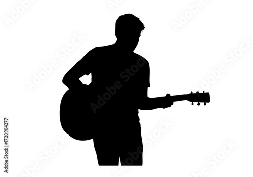 Silhouette of a Man Playing the Guitar. 