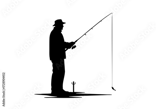 A silhouette of a fisherman peacefully casting his fishing line.
