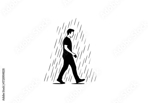 A silhouette of a person walking in the rain. 