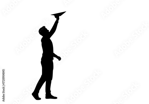 A silhouette of a person launching a paper airplane.