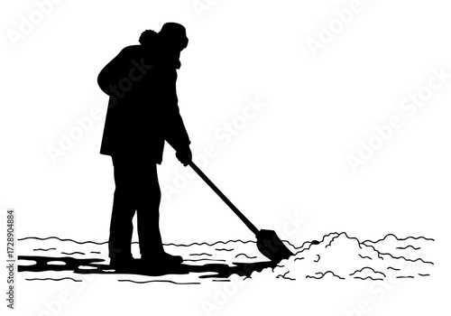 A person is shoveling snow during winter.