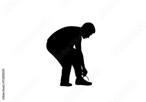 A silhouetted figure, absorbed in the act of tying a shoe.
