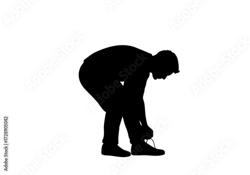 Man tying shoe, preparing for an activity.