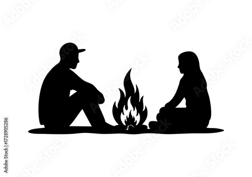 Silhouettes of two people gathered around a bonfire, evoking warmth and connection.