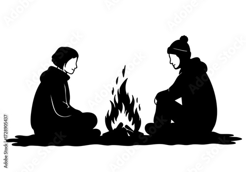 Two individuals are enjoying the warmth of a campfire during a relaxing evening.