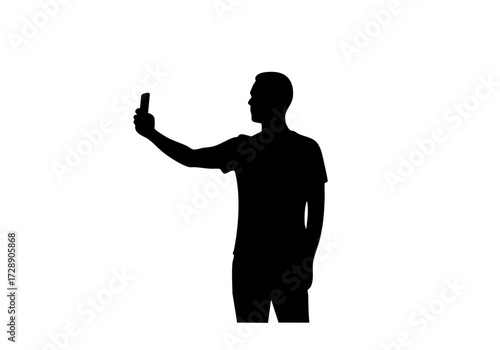 A silhouette of a person taking a photo with smartphone.
