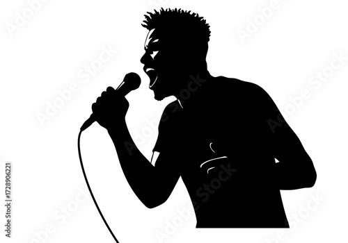 A captivating silhouette of a man passionately singing into a microphone.