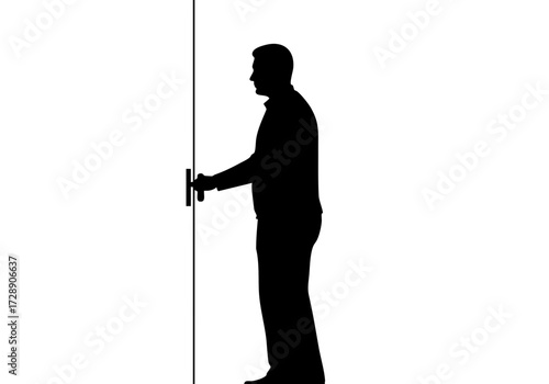 A man is opening a door silhouette.