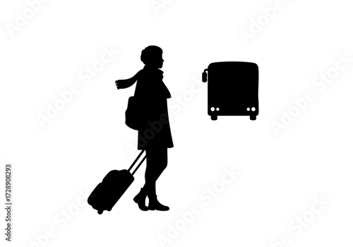 A person is waiting a bus with a luggage in transit. 