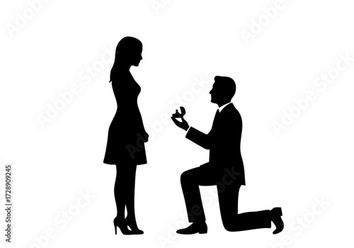 Romantic Proposal silhouette showing a man on one knee offering a ring to a woman