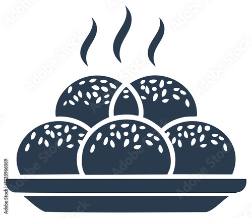 Warm freshly baked sesame seed dumplings served on a plate hot food