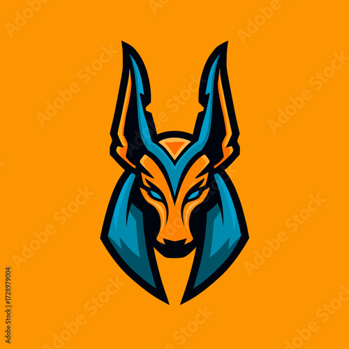 Stylized orange & teal jackal head with pointed ears, on orange background