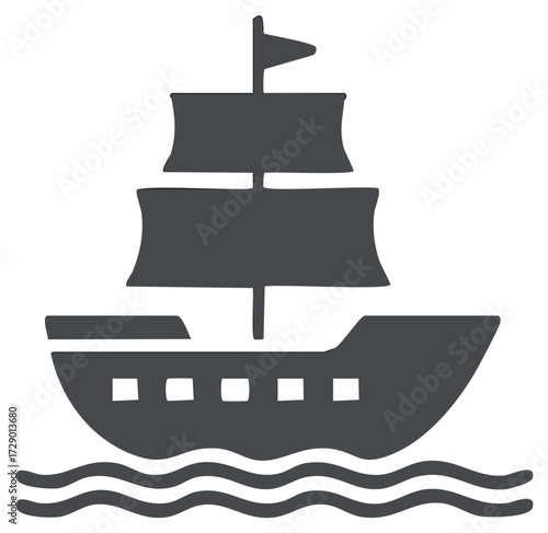 Silhouette of a historic sailing ship with sails and flag on wavy water