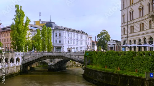 Ljubljana,Slovenia,2025,july,10th,time lapse of Ljubljanica River triple bridge
