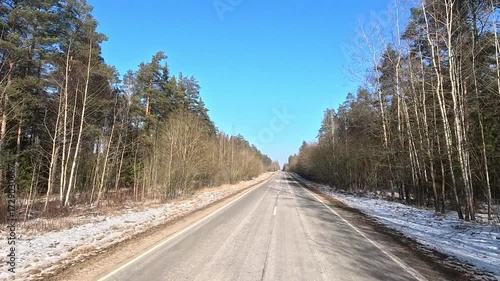 Winter road with snow, highway on a sunny winter day. Winter landscape