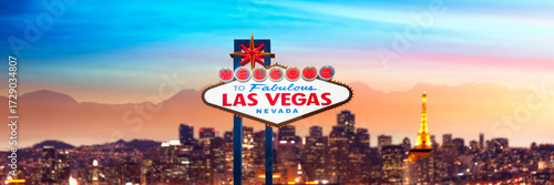 Welcome To Fabulous Las Vegas Sign Panorama With City Skyline Backdrop and Colorful City Lights